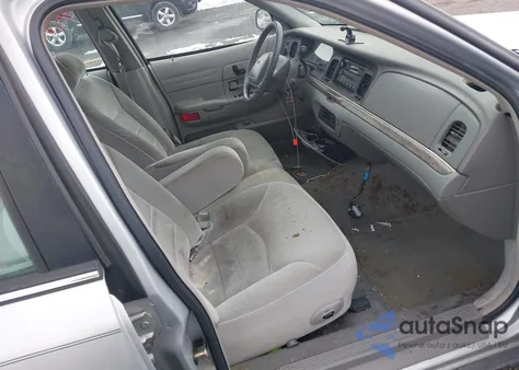 1999 Ford Crown Victoria Lx z USA, uszkodzony, nr VIN 2FAFP74W2XX158435